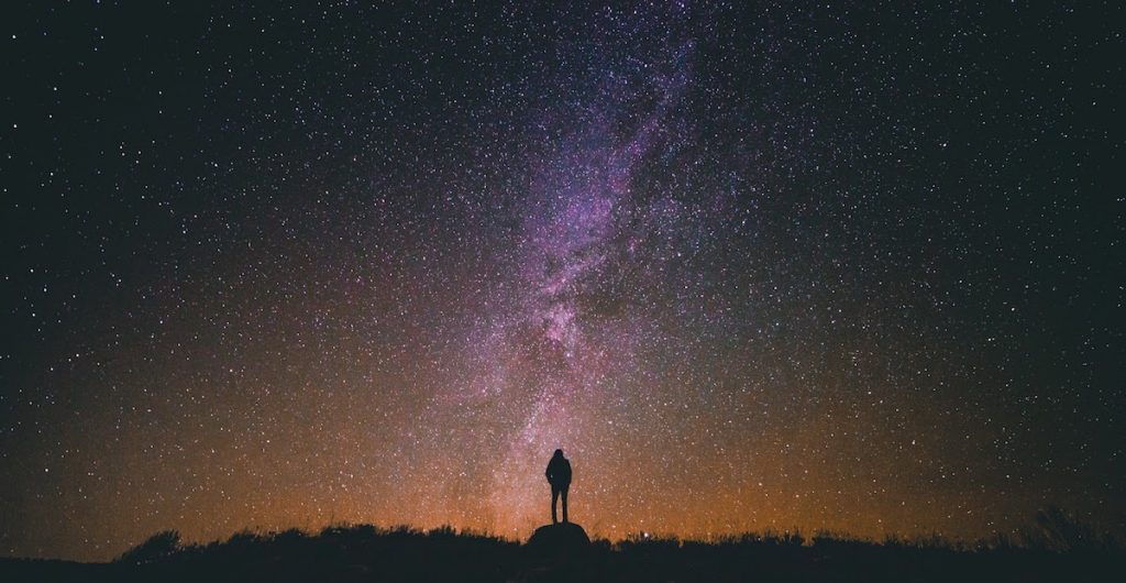 Person looking at night sky