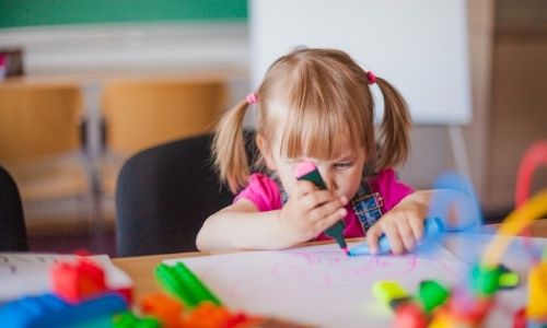 Preschooler learning to draw